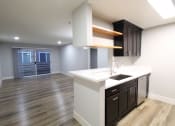 Thumbnail 2 of 31 - Entrance View, Kitchen, Living Room