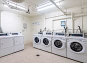 Thumbnail 17 of 37 - apartment laundry room
