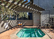 Thumbnail 37 of 37 - A small pool under a wooden pergola.