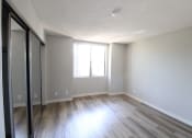 Thumbnail 6 of 37 - Large Bedrooms Mirrored Full Wall Wardrobes Flooring & Natural Light