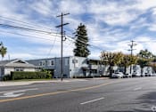 Thumbnail 38 of 40 - A street view with a house named "Laurel" on the left.