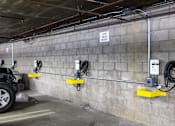 Thumbnail 21 of 31 - A wall of electrical outlets and a sign that says low head height.