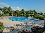 Thumbnail 5 of 47 - Pool surrounded by chairs at The Marlowe, Indiana, 46804
