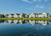 Thumbnail 38 of 47 - Reflection of houses in water at The Marlowe, Fort Wayne, Indiana