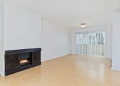 Thumbnail 12 of 12 - Fireplace next to dining room and balcony sliding glass door