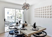 Thumbnail 7 of 18 - a dining room with a table and chairs at 8535 Colgate-Fully Furnished Apartments, Los Angeles, 90048