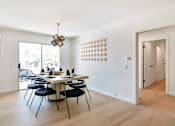 Thumbnail 6 of 18 - a dining room with a table and chairs at 8535 Colgate-Fully Furnished Apartments, Los Angeles, 90048