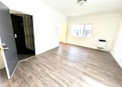 Thumbnail 14 of 23 - Entrance door directly located in the living space