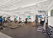 Thumbnail 15 of 34 - A spacious gym with a variety of equipment including treadmills, weights, and exercise balls at Westwood Riviera Apartments, Apartments, Los Angeles, CA