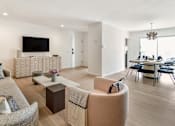 Thumbnail 2 of 18 - a living room and dining room with a table and chairs at 8535 Colgate-Fully Furnished Apartments, Los Angeles, CA, 90048
