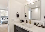 Thumbnail 8 of 18 - a bathroom with a sink and a mirror at 8535 Colgate-Fully Furnished Apartments, Los Angeles, CA, 90048