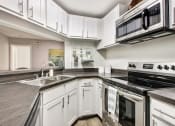 Thumbnail 20 of 34 - Fully Furnished Kitchen at Timberwalk at Mandarin Apartment Homes, Jacksonville, Florida