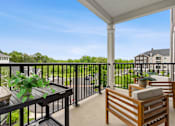 Thumbnail 19 of 19 - Balcony with Yard View at Merion Marlton Apartment Homes, Marlton, New Jersey