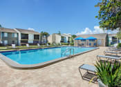 Thumbnail 17 of 32 - Outdoor pool area at The Fountains at Deerwood Apartments, Jacksonville