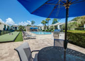 Thumbnail 16 of 32 - Outdoor pool at The Fountains at Deerwood Apartments, Jacksonville, Florida