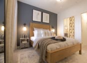 Thumbnail 21 of 36 - a bedroom with a bed and two lamps and a closet  at Carillon Woods, Millsboro, Delaware
