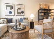 Thumbnail 19 of 36 - a living room with couches and chairs and a table  at Carillon Woods, Millsboro, DE