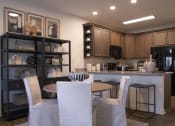 Thumbnail 14 of 36 - a kitchen and dining room with a table and chairs  at Carillon Woods, Millsboro