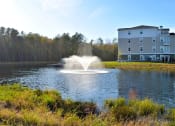 Thumbnail 27 of 36 - Lake With Fountain at Carillon Woods, Millsboro, DE, 19966