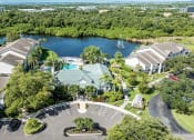 Thumbnail 20 of 20 - an aerial view of the apartment building with a lake in the background at Champions Walk Apartment Homes, Bradenton, Florida