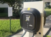 Thumbnail 25 of 32 - a parking meter on the side of a sidewalk at The Fountains at Deerwood, Jacksonville, FL, 32256