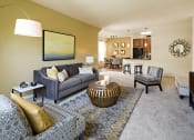 Thumbnail 7 of 27 - a living room with a couch and a table at Merion Stratford Apartment Homes, Stratford