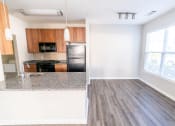 Thumbnail 23 of 27 - Living And Kitchen at Merion Stratford Apartment Homes, Stratford