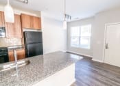 Thumbnail 22 of 27 - Open Concept Kitchen at Merion Stratford Apartment Homes, Stratford, Connecticut