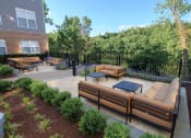 Thumbnail 23 of 26 - Outdoor Lounge at Merion Riverwalk Apartment Homes, Shelton, CT, 06484
