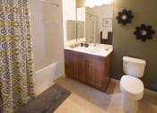 Thumbnail 9 of 27 - a bathroom with a sink toilet and a shower at Merion Stratford Apartment Homes, Connecticut, 06614