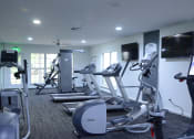 Thumbnail 20 of 32 - Gym at The Fountains at Deerwood Apartments, Jacksonville, FL, 32256