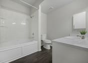 Thumbnail 27 of 29 - bright clean spacious bathroom with bathtub