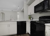 Thumbnail 26 of 29 - open kitchen with large countertop space