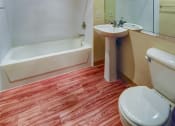 Thumbnail 12 of 22 - a bathroom with a toilet sink and a bath tub