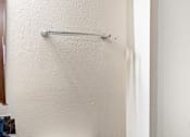 Thumbnail 8 of 29 - A white door with a silver handle and a silver bar.