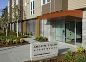 Thumbnail 3 of 22 - The front of a building with the sign 