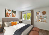 Thumbnail 3 of 41 - a bedroom with a large bed and a window