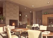 Thumbnail 5 of 5 - a living room with tables and chairs and a fireplace