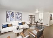 Thumbnail 1 of 41 - a living room with white couches and chairs and a dining room with a table