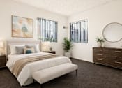 Thumbnail 4 of 20 - bedroom with bed, brown carpet and windows
