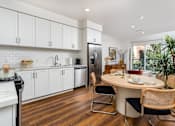 Thumbnail 50 of 104 - Dining Room With Energy Efficient Appliances at Fedora Bliss LLC, Woodland Hills, CA, 91367