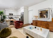Thumbnail 49 of 104 - Living Room With Kitchen View at Fedora Bliss LLC, California, 91367