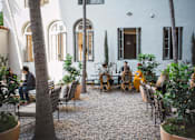 Thumbnail 18 of 36 - Outdoor Patio at Villa Carlotta – Furnished Apartments, Los Angeles, 90028