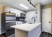 Thumbnail 1 of 33 - kitchen island at The Luxe of Southaven, Southaven