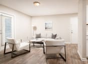 Thumbnail 8 of 20 - Living Room with Chairs at Arbor Park Apartments, Jackson, MS, 39209