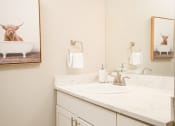 Thumbnail 15 of 20 - Bathroom with Mirror at Arbor Park Apartments, Jackson, MS, 39209