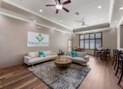 Thumbnail 4 of 19 - a living room with couches and a coffee table at Valley View Estates, Council Bluffs, IA, 51503