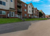 Thumbnail 3 of 19 - a view of the exterior of a building at the whispering winds apartments at Valley View Estates, Council Bluffs