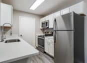 Thumbnail 7 of 33 - Kitchen at The Luxe of Southaven, Southaven