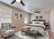 Thumbnail 6 of 12 - a bedroom with a bed and a ceiling fan